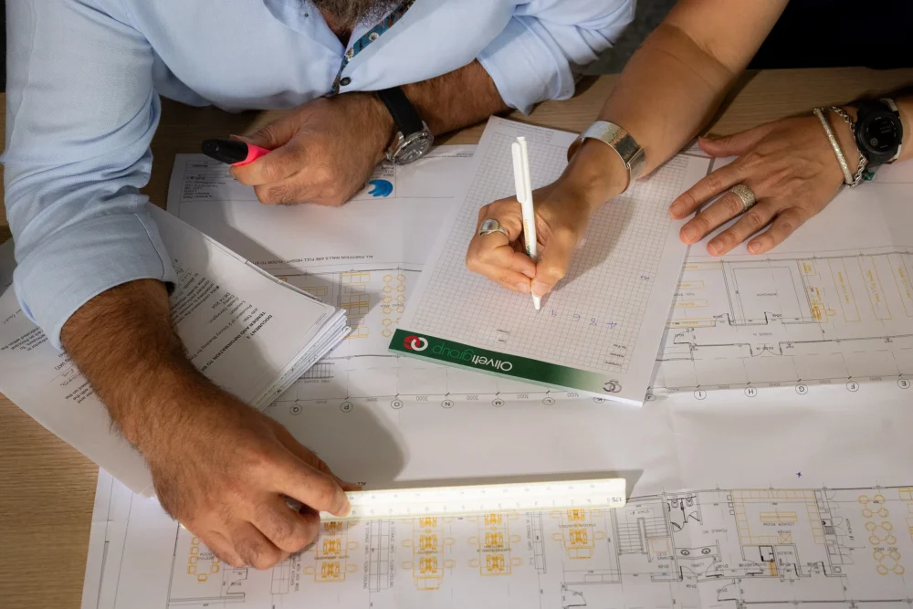 2 people editing plans